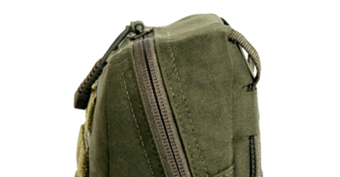 The angle means it is easier to grab the zipper pull when on your kit.