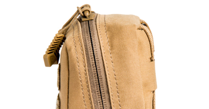 The angle means it is easier to grab the zipper pull when on your kit.