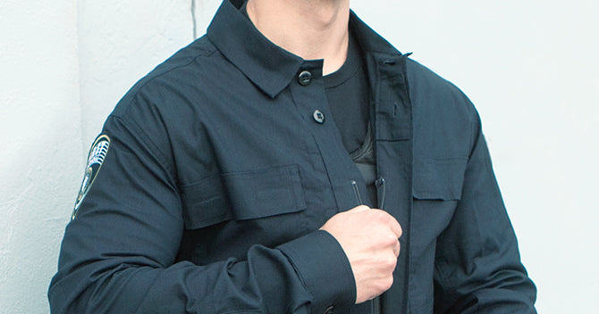 Traditional BDU features like button down collars and a hidden zip front placket provide a neat, clean, and professional look.