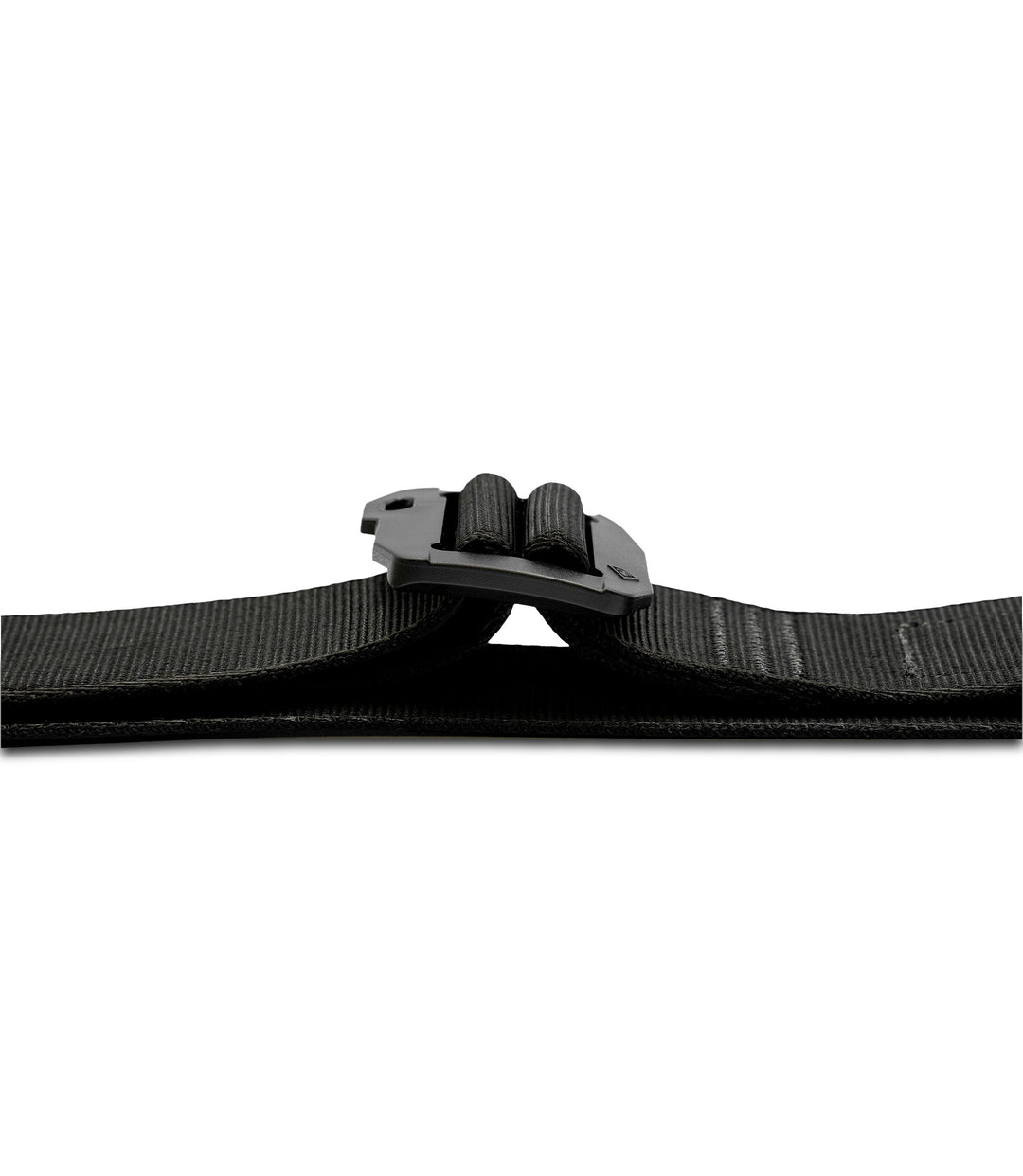 Close-up of a black webbed belt with a black plastic quick-release buckle lay flat on a plain white background |color_black