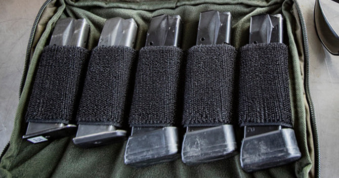 Holds pistol mag on interior loop elastic along with your other hook/loop pouches.