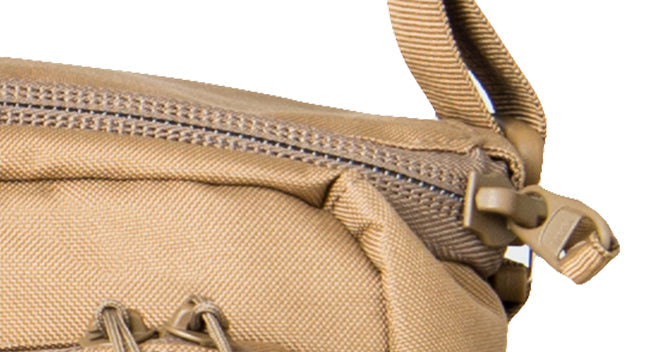 Depending on your needs, the main compartment has a hook/loop flap, which opens the zipper loop allowing the zipper sliders to overlap for easy locking.
